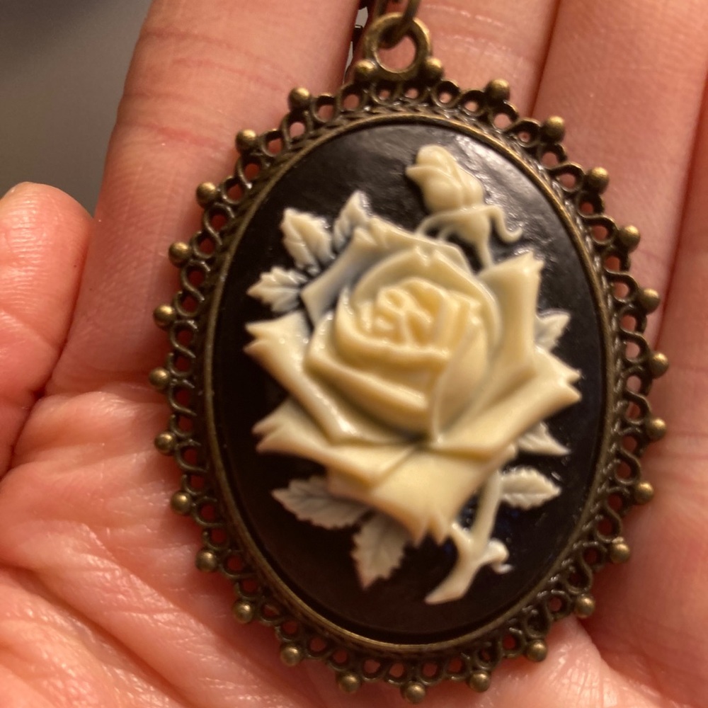 Goth rose pendant on a chain